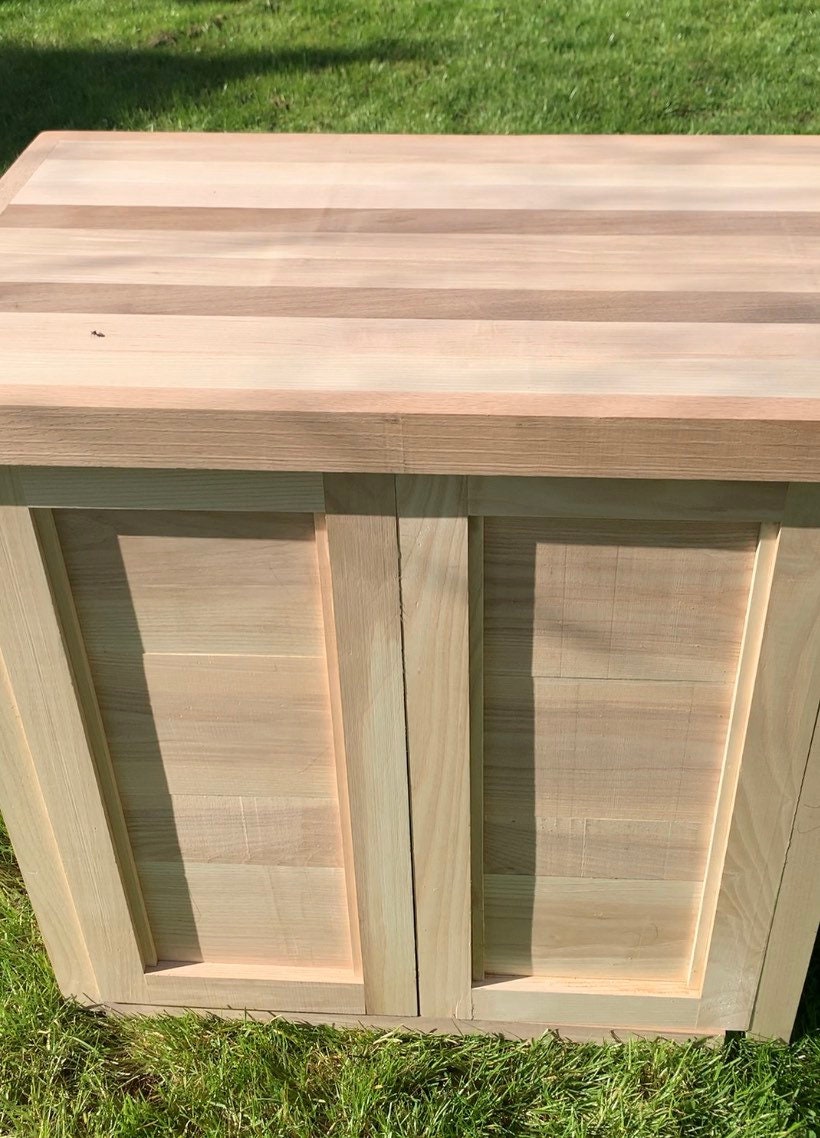 Farmhouse kitchen island with butchers block, cutting or chopping board and storage cupboard