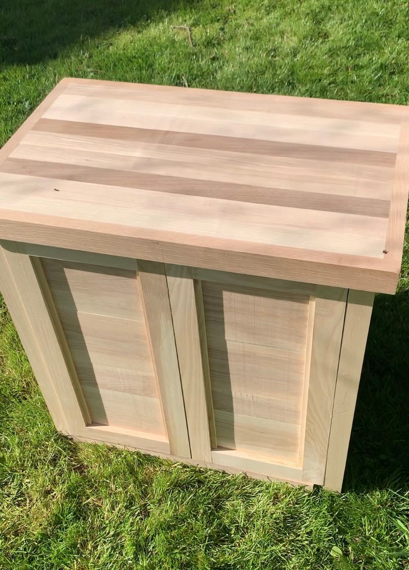 Farmhouse kitchen island with butchers block, cutting or chopping board and storage cupboard