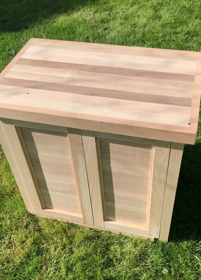 Farmhouse kitchen island with butchers block, cutting or chopping board and storage cupboard