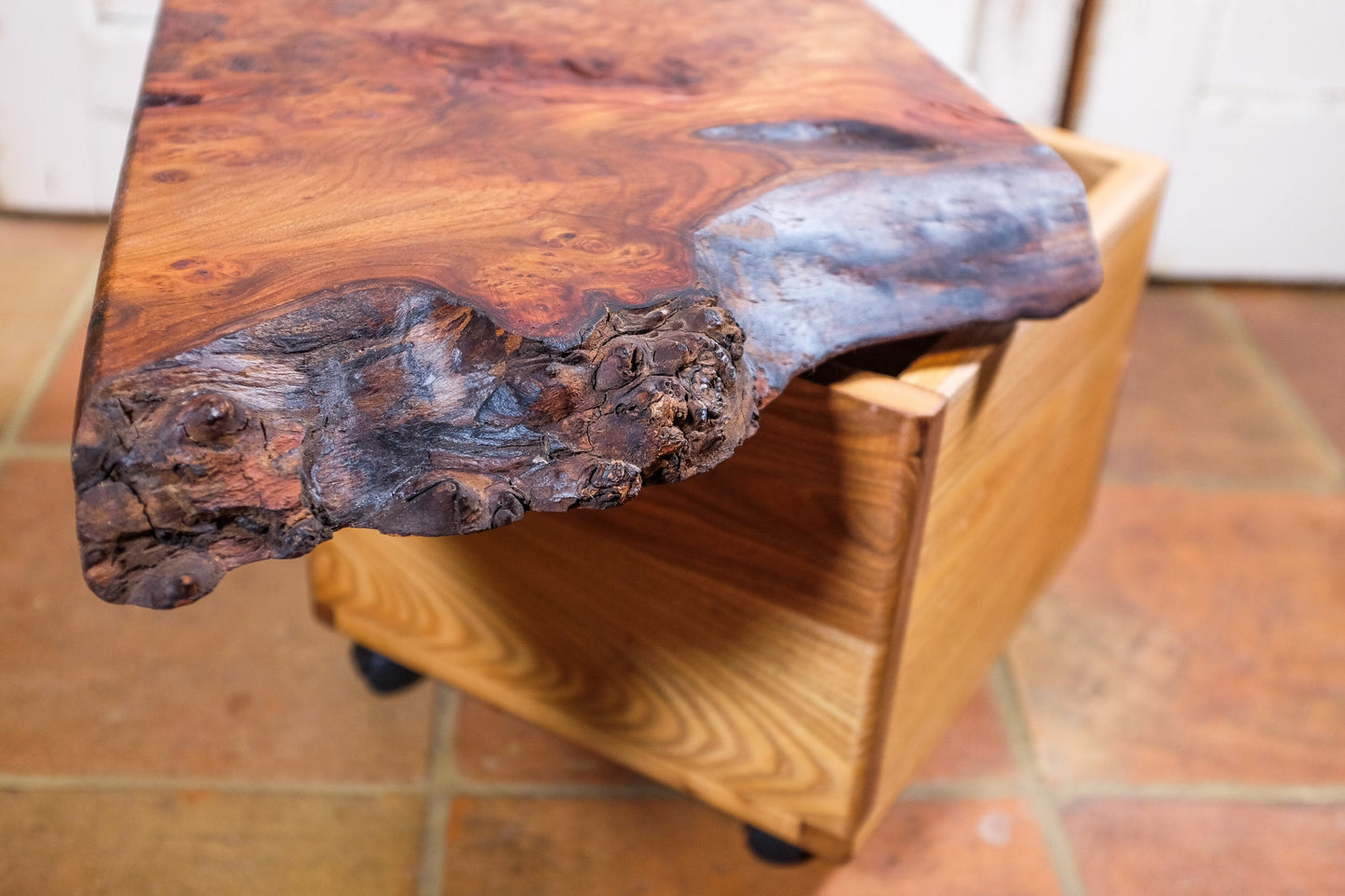 Live natural edge coffee table with storage unit.