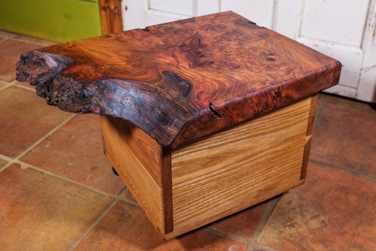 Live natural edge coffee table with storage unit.