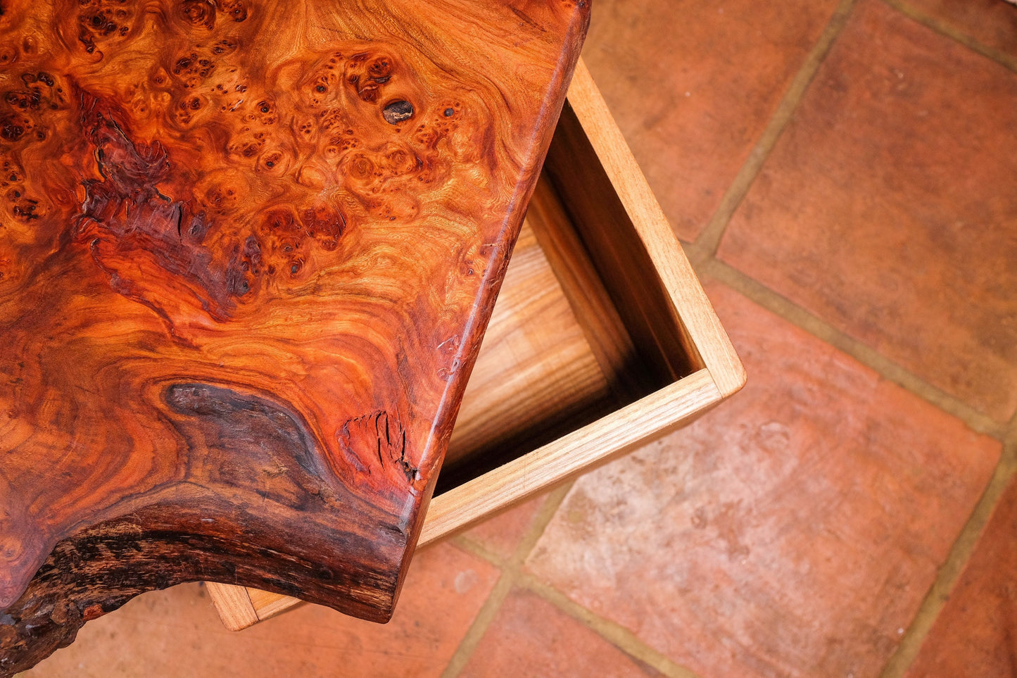 Live natural edge coffee table with storage unit.